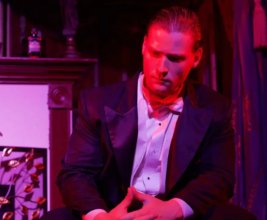 Nimrod Endvelt as Arthur Birling in a reflective moment